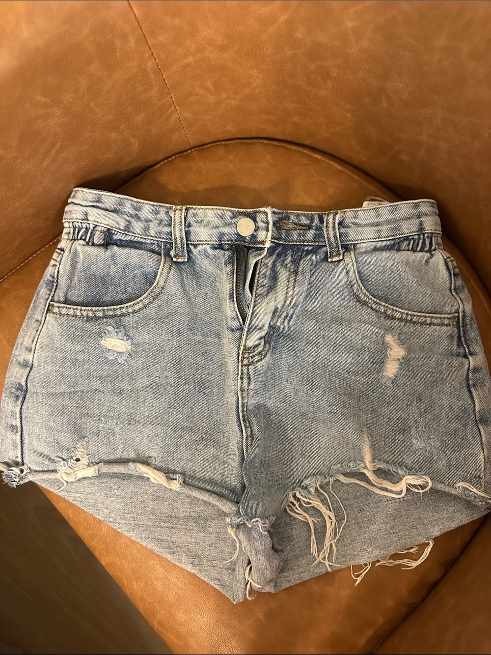 High-Rise Light Blue Distressed Denim Shorts